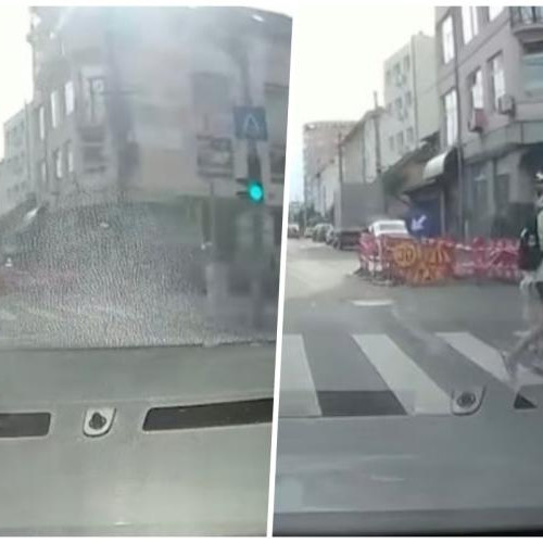 Mamă surprinsă traversând pe roșu cu fiica ei