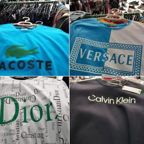 Trei persoane din Galați suspectate de vânzarea de haine contrafăcute la Adjud