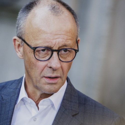 Cancelarul german provoacă controverse privind orele de muncă și concediul medical