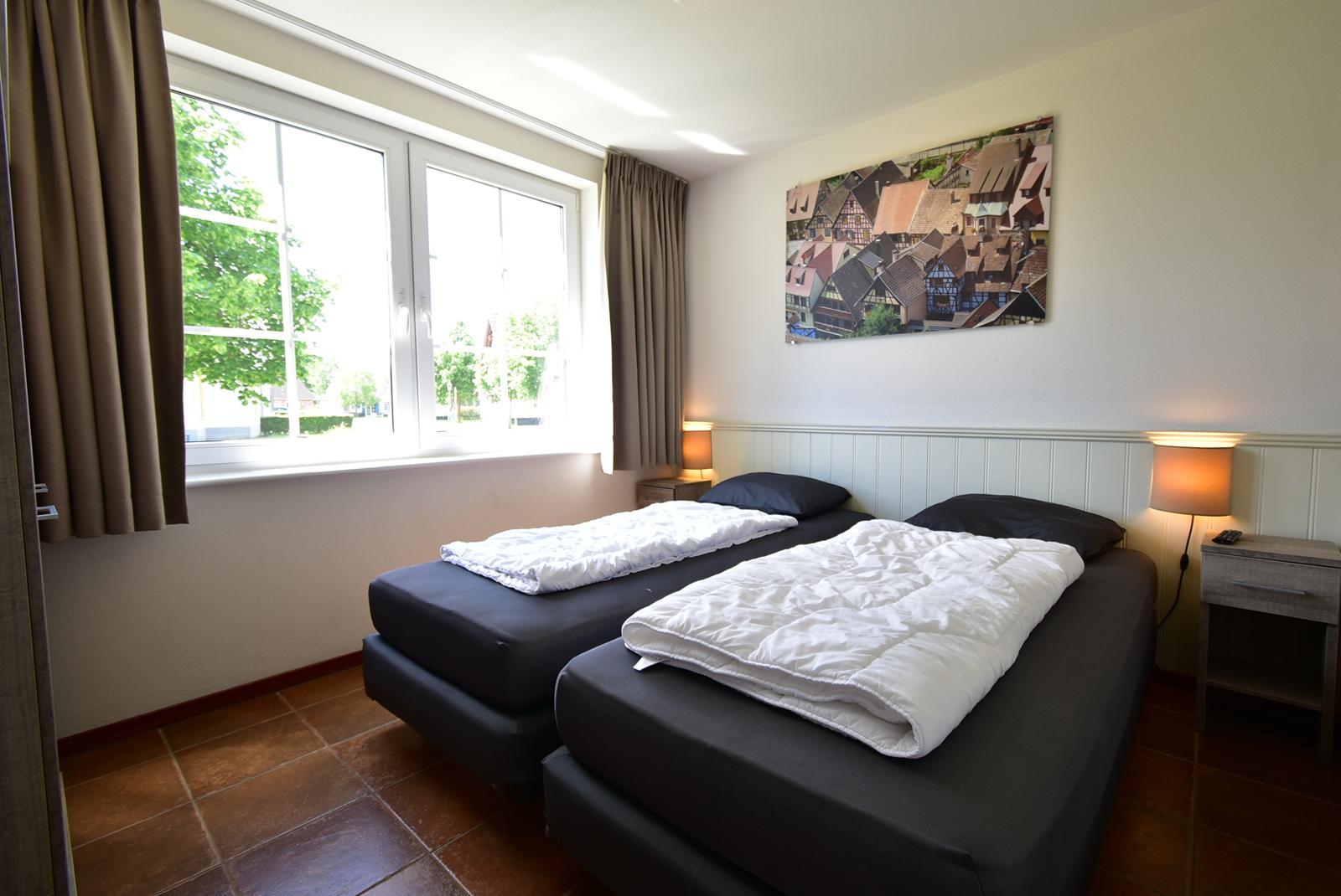 kopen-vrijstaande-vakantiewoning-cochem-slaapkamer-1-begane-grond-recreatieadviseurs-vakantiehuistekoop-nl.jpg.JPG