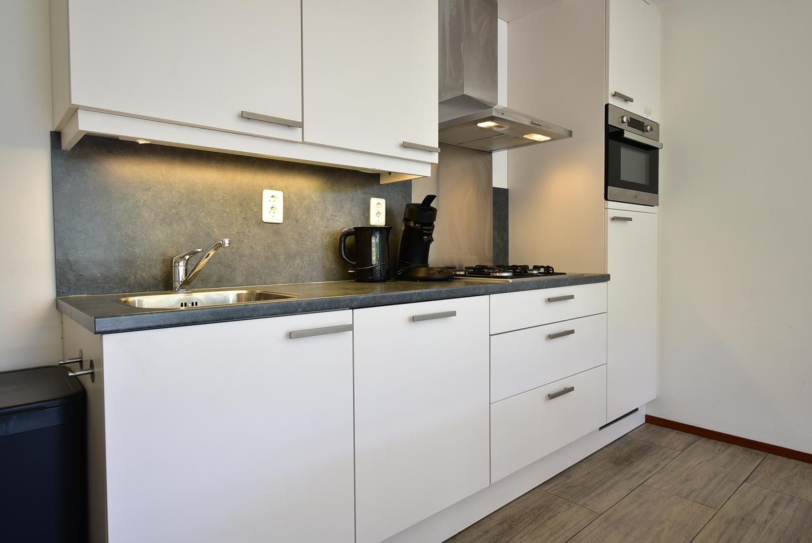 kopen-vrijstaande-vakantiewoning-ouddorp-open-keuken-en-inbouwapparatuur-recreatieadviseurs-vakantiehuistekoop-nl.jpg.JPG