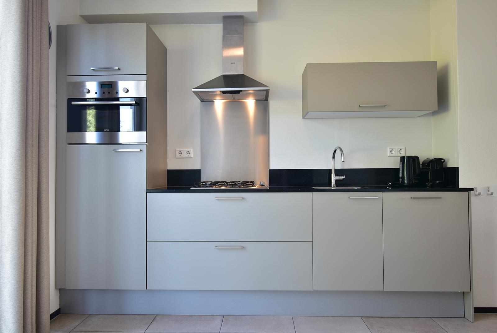 kopen-twee-onder-een-kap-ouddorp-keuken-inbouwapparatuur-moderne-afwerking-vakantiehuistekoop-nl-prins-en-prins-makelaardij.jpg.jpg