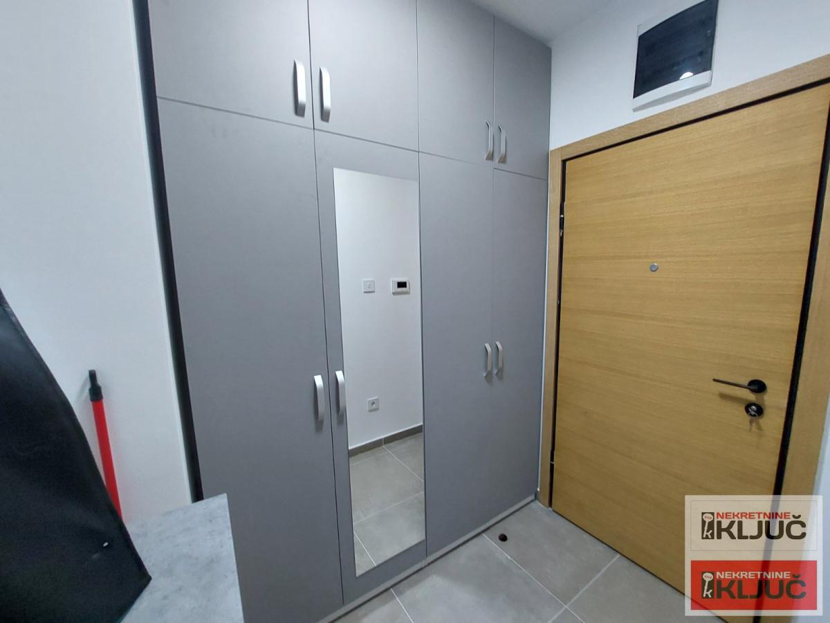 AVIJATIČARSKO NASELJE IZDAJE JEDNOIPOSOBAN MODERNO OPREMLJEN STAN SA GARAŽNIM MESTOM 13