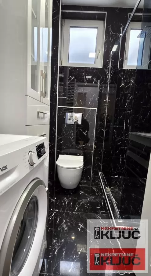 PODBARA IZDAJE SE TROSOBAN MODERNO OPREMLJEN STAN SA GARAŽOM 26