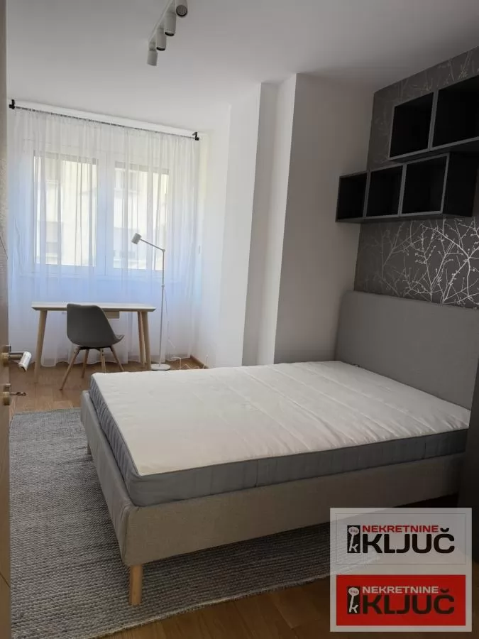 BULEVAR OSLOBOĐENJA IZDAJE SE ČETVOROSOBAN MODERNO OPREMLJEN STAN SA GARAŽNIM MESTOM 14