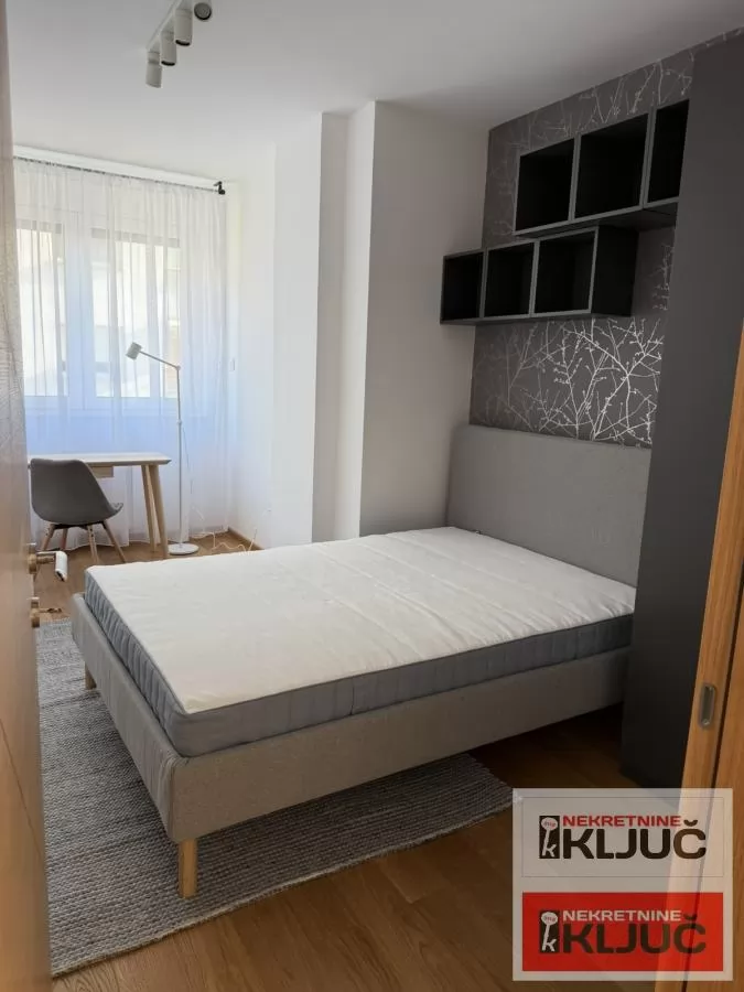 BULEVAR OSLOBOĐENJA IZDAJE SE ČETVOROSOBAN MODERNO OPREMLJEN STAN SA GARAŽNIM MESTOM 15