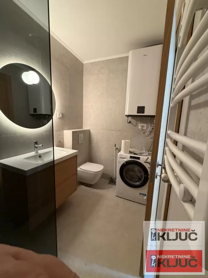 BULEVAR OSLOBOĐENJA IZDAJE SE ČETVOROSOBAN MODERNO OPREMLJEN STAN SA GARAŽNIM MESTOM 31