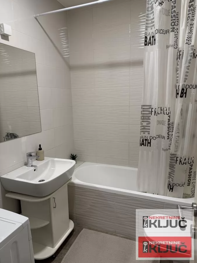 SOCIJALNO-modena garsonjera sa GARAŽNIM MESTOM 6