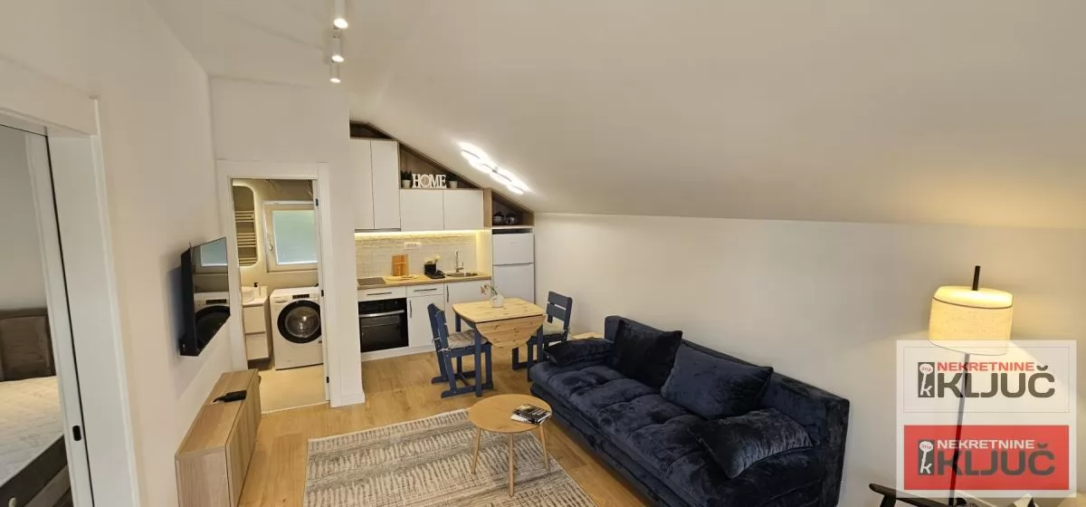 CENTAR IZDAJE SE MODERAN APARTMAN SA PARKING MESTOM 1