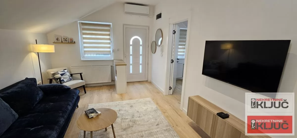 CENTAR IZDAJE SE MODERAN APARTMAN SA PARKING MESTOM 4