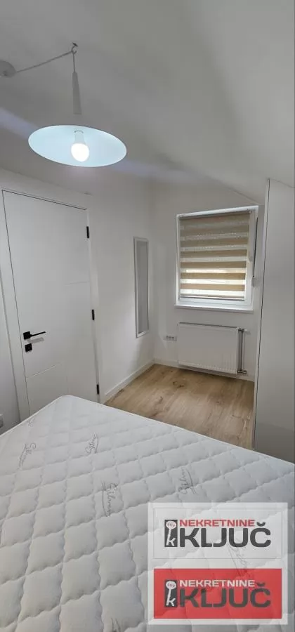 CENTAR IZDAJE SE MODERAN APARTMAN SA PARKING MESTOM 8