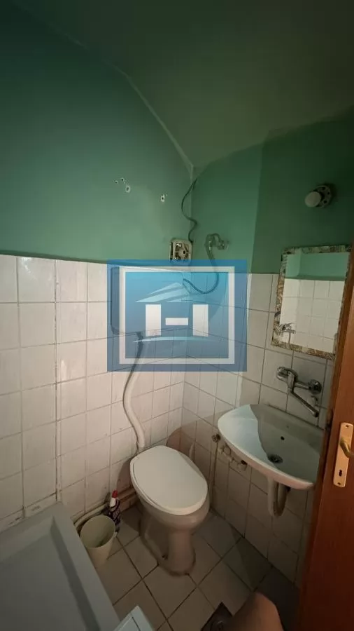 Prodaja garsonjere u centru grada-25m2 ,zgrada sa liftom 7