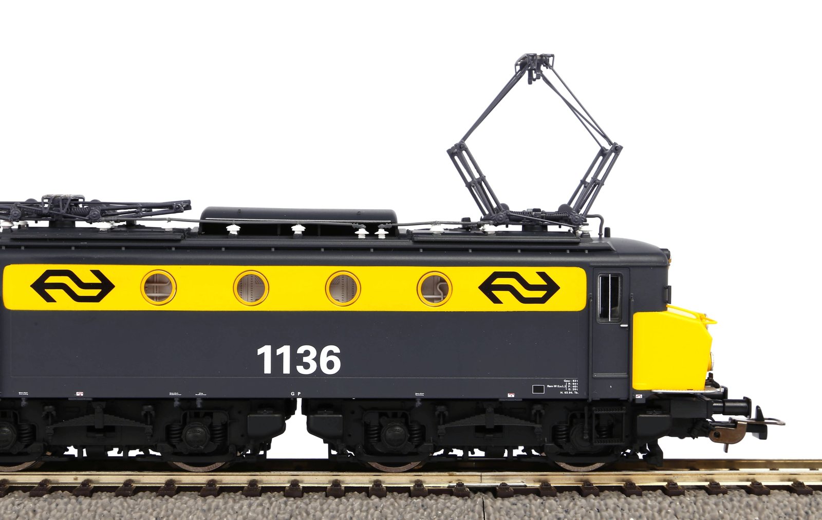~E-Lok Rh 1100 NS gelb-grau IV + PluX22 Dec.