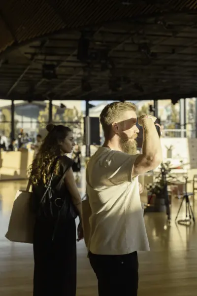 Alica Weber and Esa Hiltunen at POV 2025, standing in the foyer of the National Dance Theatre