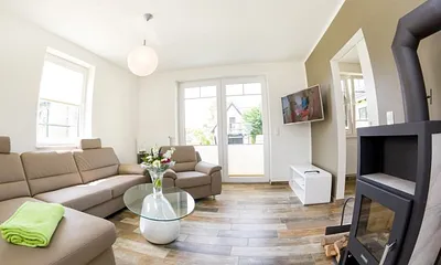 Wohnzimmer mit Ausgang zur Terrasse