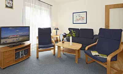 Wohnzimmer mit komfortabler Schlafcouch