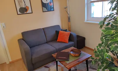 Sitzecke mit Schlafcouch