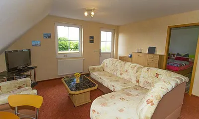 Wohnbereich mit Schlafcouch 