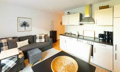 Wohnzimmer mit Küche