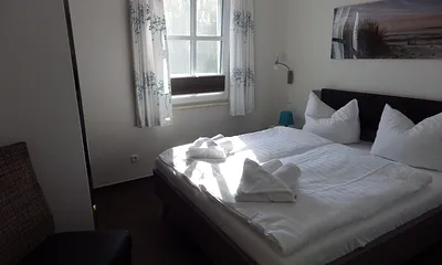 Schlafzimmer mit Flat-TV