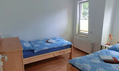 Schlafzimmer mit 2 Einzelbetten