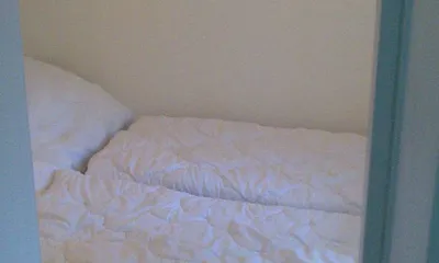 Separates Sclafzimmer mit Doppelbett