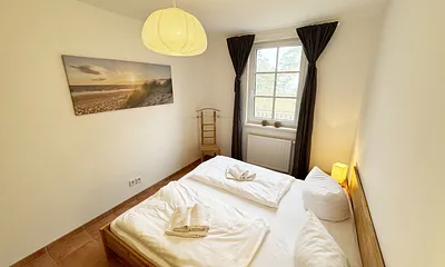 Schlafzimmer mit Doppelbett