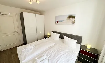 Wohnung  Ostseesilber - Schlafzimmer mit Doppelbett