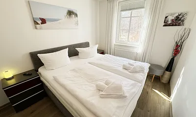 Wohnung  Ostseesilber - Schlafzimmer mit Doppelbett