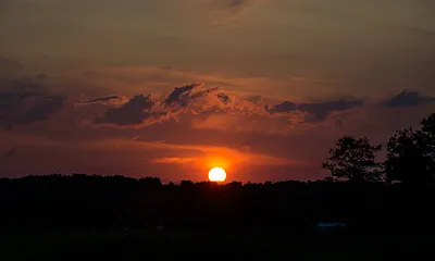 Genießen sie den Sonnenuntergang am Achterwasser von ihrer Terrasse aus