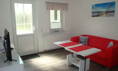 Der Wohn- und Essbereich mit Terrassenzugang