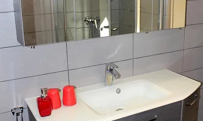 Im modernen Badmöbel finden alle Ihre Utensilien Platz 