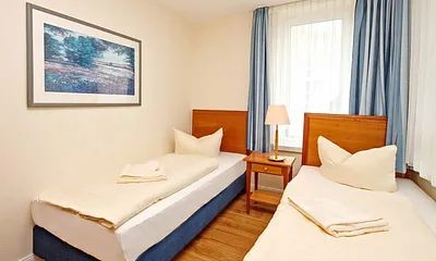 Schlafzimmer mit Einzelbetten