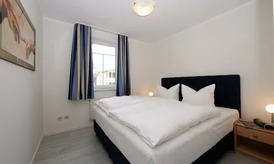 Schlafzimmer mit Doppelbett