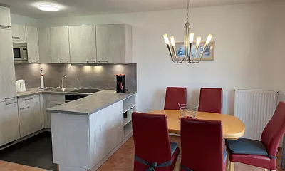 Wohnzimmer mit Küche