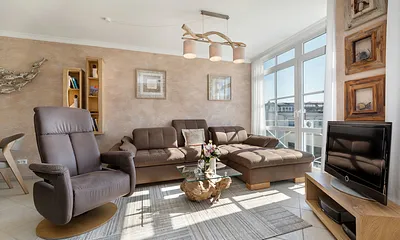 Freuen Sie sich auf einen Urlaub in einer liebevoll und hochwertig eingerichteten Traumferienwohnung! Auf der Couch kann für ein Kind bis 12 Jahre aufgebettet werden.