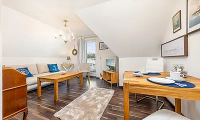 Das Wohnzimmer mit TV und kostenfreiem WLAN.