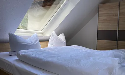 Schlafbereich mit 1,80 m Doppelbett 