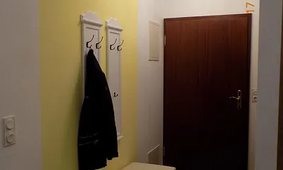 Eingangsbereich mit Flurgaderobe mit Ledersitzbank