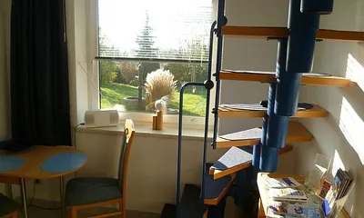 Wendeltreppe in die erste Etage