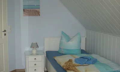 Schlafzimmer mit 2 Einzelbetten