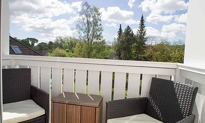 Balkon mit Sitzmöbeln