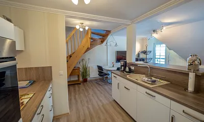 schlichte und elegante Formen in der Küche, in der es an nichts fehlt