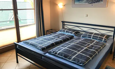 Schlafzimmer mit französischen Balkon