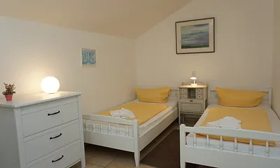Schlafzimmer mit Einzelbetten
