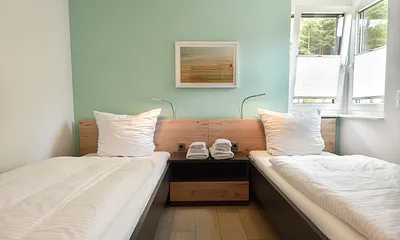 Schlafzimmer mit Einzelbetten