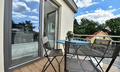 Balkon mit Sitzgelegenheiten