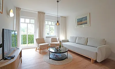  Wohnzimmer mit Schlafcouch