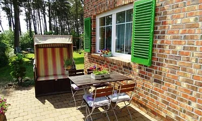 Terasse mit Grill und Sitzmöbel