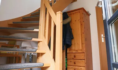 Treppe zur Ferienwohnung Herzmuschel
